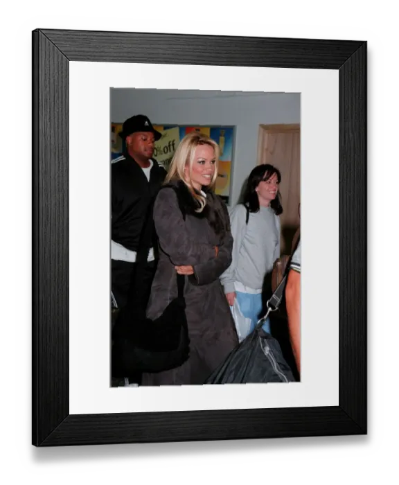 Framed Print : Pamela Anderson Actress September 98 Leaving Heathrow airport for Berlin Framed Print : Pamela Anderson Actress September 98 Leaving Heathrow airport for Berlin