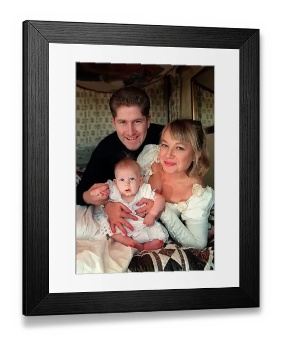 Framed Print : Actress Nicola Duffett with husband Ian Henderson 1995 and baby at home