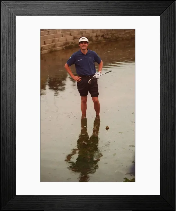 Framed Print : Jean Van de Velde attempts to play from the water on the 18th hole at the 1999 British