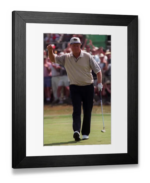 Framed Print : Jack Nicklaus Golfer celebrates after putting a birdie on the 13th during the second