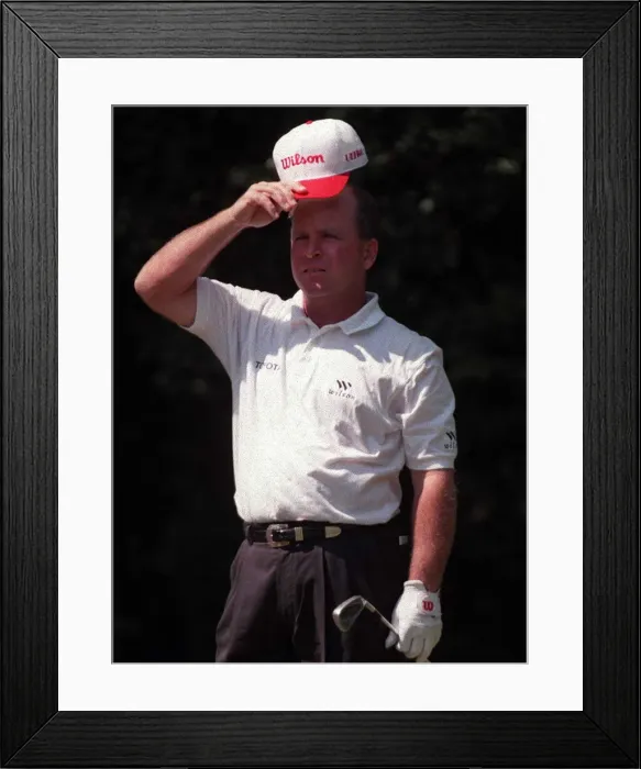 Framed Print : Mark McCumber Golfer watches the ball after teeing off during the second round in Framed Print : Mark McCumber Golfer watches the ball after teeing off during the second round in
