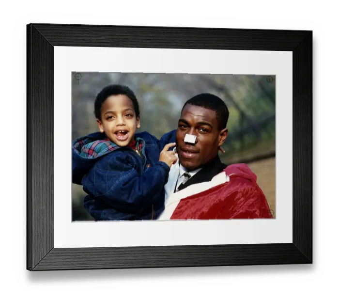 Framed Print : Frank Bruno boxer with Joshua Dennis with charity stamp on his nose