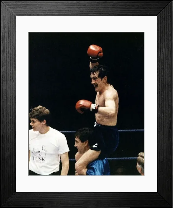  : Barry McGuigan Boxing is lifted on to the shoulders of his trainer Jimmy Tibbs after