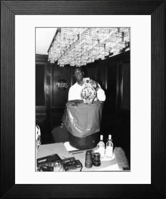  : Riddick Bowe Boxer The Undisputed World Heavyweight Championship Puts His WBC Belt Into