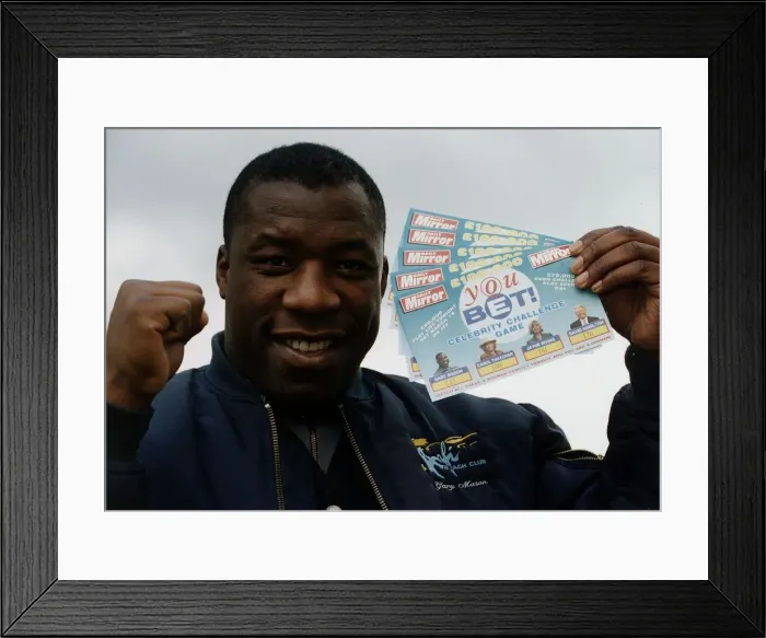 Framed Print : Gary Mason Boxing Heavywieght boxer holding up Daily Mirror You Bet game cards Framed Print : Gary Mason Boxing Heavywieght boxer holding up Daily Mirror You Bet game cards