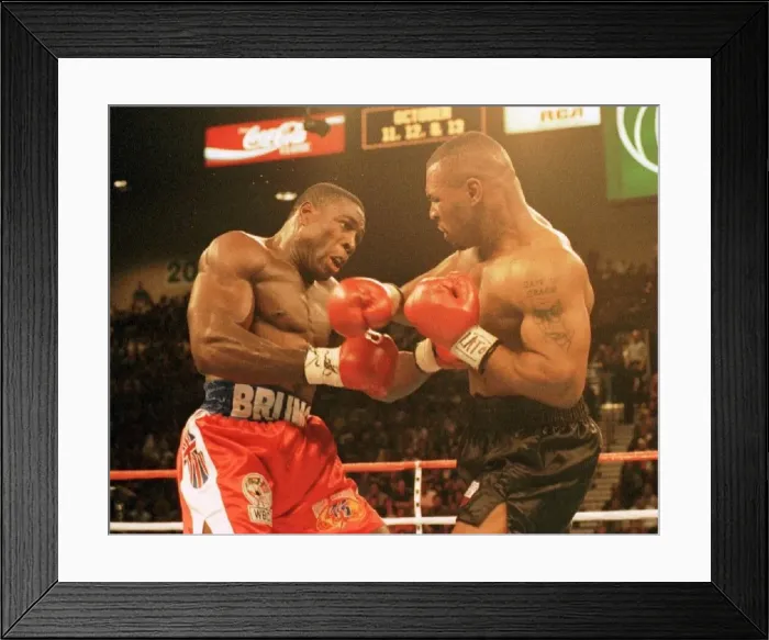 Framed Print : Frank Bruno and Mike Tyson battle it out during the WBC world title fight in Las Vegas
