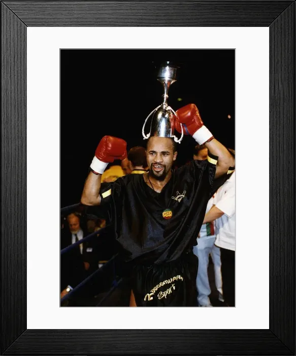Framed Print : LLoyd Honeyghan Boxing With commonweath championship cup on head