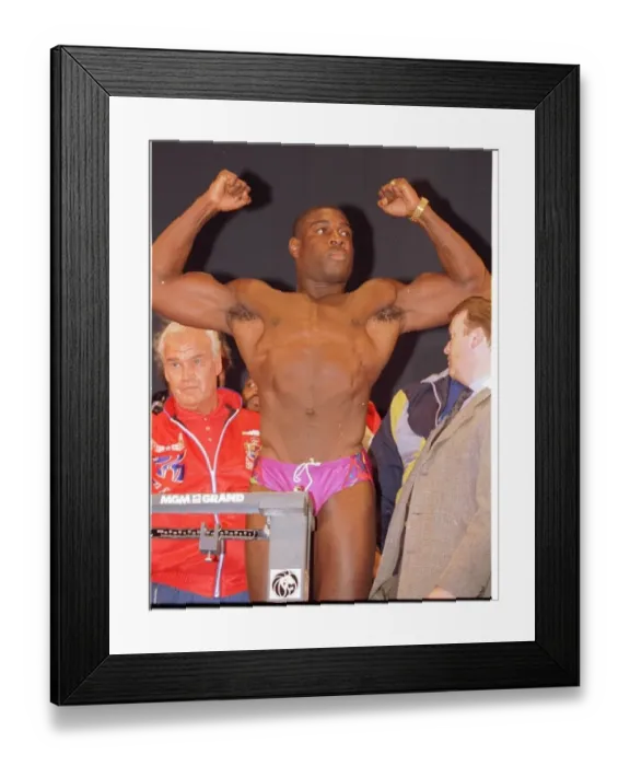 Framed Print : Frank Bruno flexes his muscles at the weigh in. Ready for the fight against Mike Tyson in