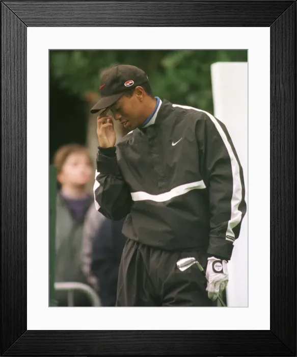 Framed Print : Tiger Woods in some discomfort from flu October 1998 during his practice round Framed Print : Tiger Woods in some discomfort from flu October 1998 during his practice round