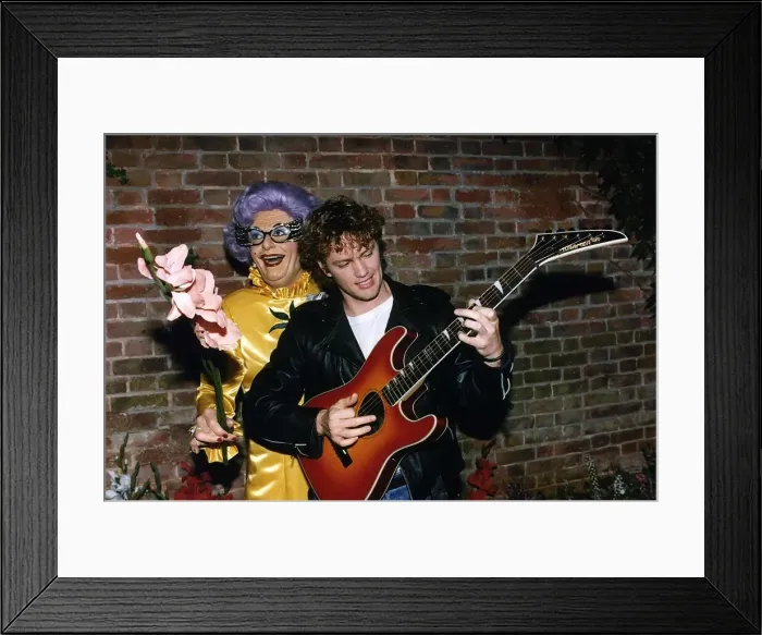 Framed Print : Craig Mclachlan the actor and singer with the man who plays the part of Dame Edna Framed Print : Craig Mclachlan the actor and singer with the man who plays the part of Dame Edna