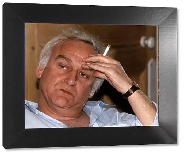 John Thaw actor at home smoking a cigarette, He has starred in such TV programmes