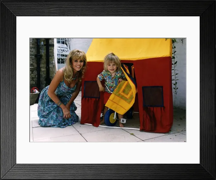 Framed Print : Britt Ekland Film Actress with her son TJ A©Mirrorpix Framed Print : Britt Ekland Film Actress with her son TJ A©Mirrorpix