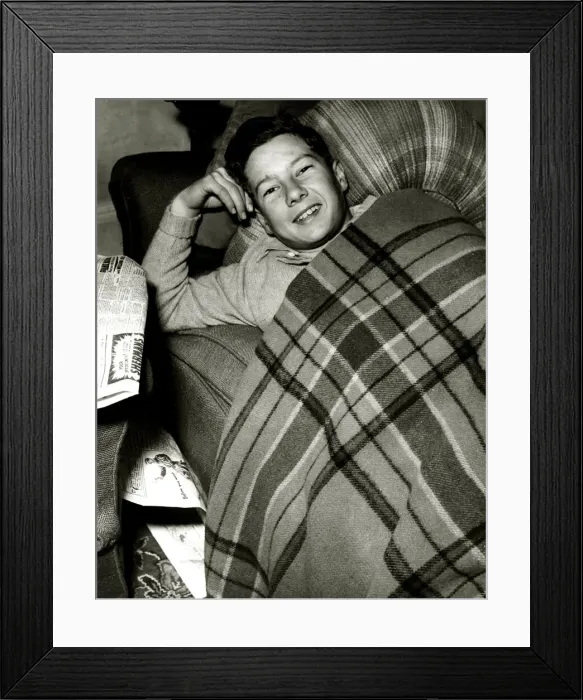 Framed Print : Lester Piggott, the boy jockey, is resting at his home at Lambourn, Berkshire Framed Print : Lester Piggott, the boy jockey, is resting at his home at Lambourn, Berkshire