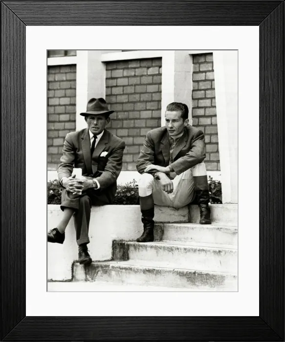 Framed Print : Lester Piggott sits outside the weighing-in room, chatting with friends