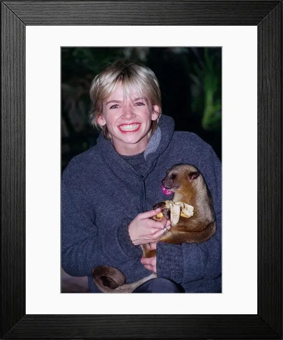 Framed Print : Zoe Ball Radio  /  TV Presenter October 1998 At London Zoo holding a baby bear she has