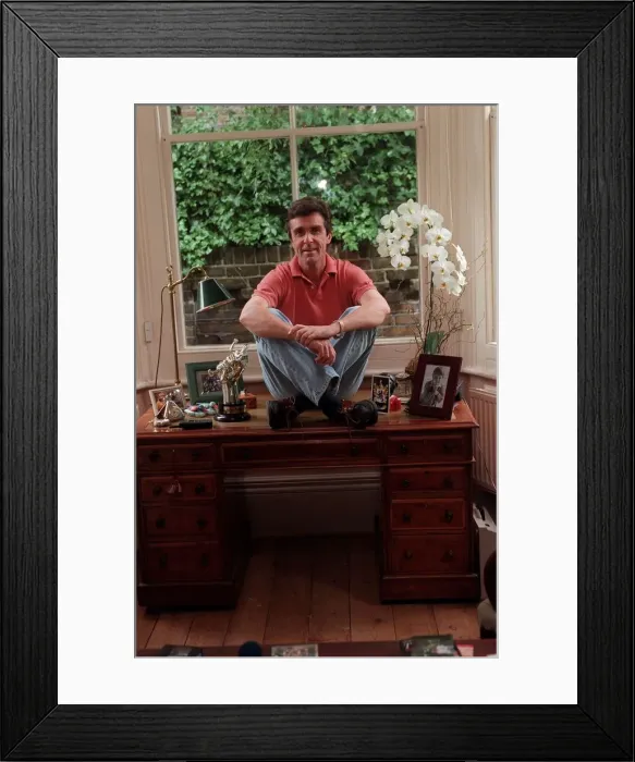 Framed Print : John Stapleton TV Presenter September 1998 At home sitting on his desk Framed Print : John Stapleton TV Presenter September 1998 At home sitting on his desk