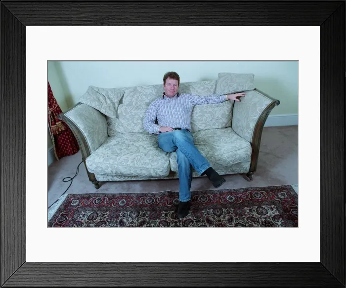 Framed Print : Jim Davidson Comedian / TV Presenter October 1998 Sitting on sofa at home Framed Print : Jim Davidson Comedian / TV Presenter October 1998 Sitting on sofa at home