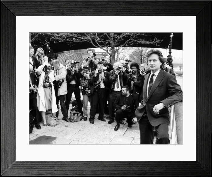 Framed Print : Michael Douglas actor leans on wall being photographed Framed Print : Michael Douglas actor leans on wall being photographed