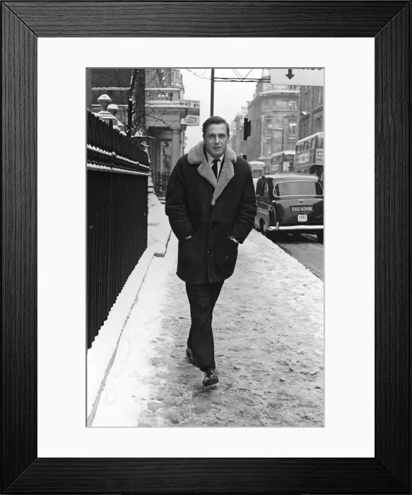 Framed Print : TV Presenter David Attenborough - March 1965 - walking to work on a snowy morning the day Framed Print : TV Presenter David Attenborough - March 1965 - walking to work on a snowy morning the day