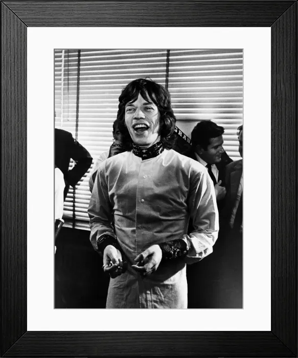 Framed Print : Rolling Stones singer Mick Jagger holding a press conference at Granada Studios in Soho
