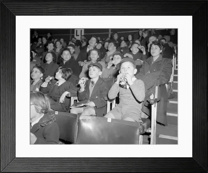Framed Print : Bertram Mills Circus Audience Dec 1952 Children cover their faces with their food