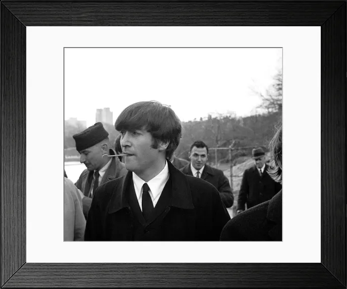 Framed Print : John Lennon in New Yorks Central Park, for a photocall on 9 February 1964
