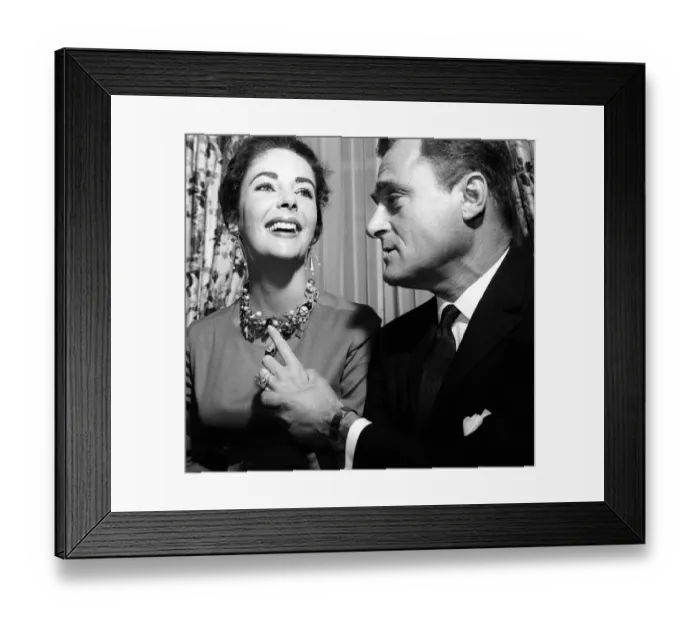 Framed Print : Elizabeth Taylor April 1957 with Husband Mike Todd showing off diamond ring Framed Print : Elizabeth Taylor April 1957 with Husband Mike Todd showing off diamond ring