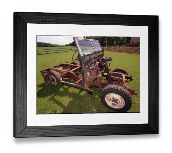 Framed Print : Land Rover in stages of building July 1998 Donar Vehicle from this parts are taken to Framed Print : Land Rover in stages of building July 1998 Donar Vehicle from this parts are taken to