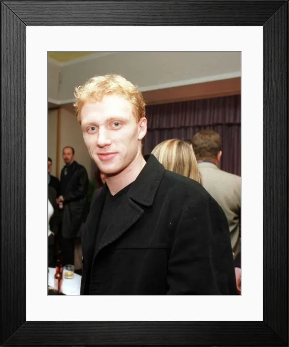 Framed Print : Actor Kevin McKidd wearing black jacket, in a room full of people
