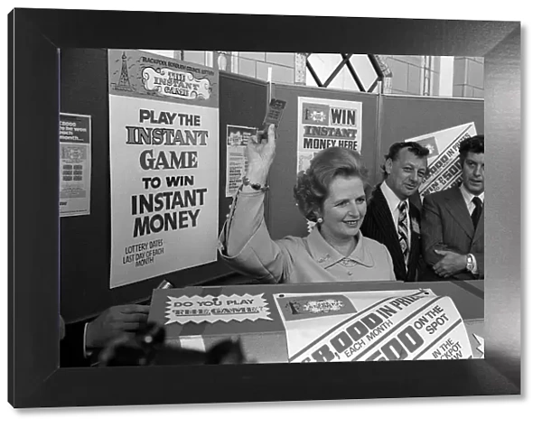 Margaret Thatcher October 1977 holds up an instant game ticket Conservative Party