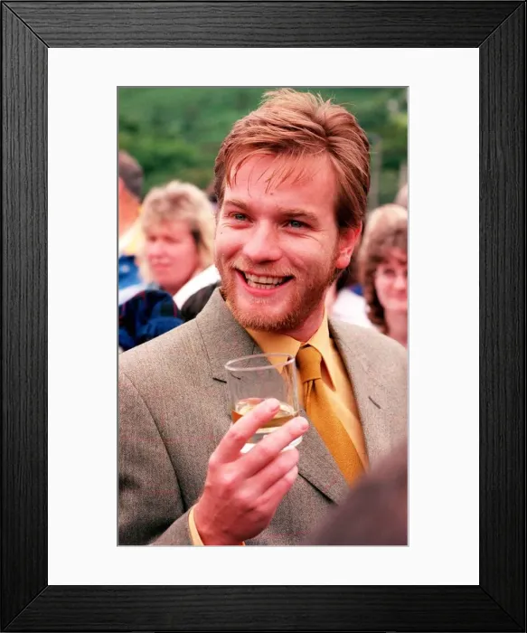 Framed Print : Ewan McGregor actor 26th July 1998 drinking glass of whisky at Isle of Arran whisky Framed Print : Ewan McGregor actor 26th July 1998 drinking glass of whisky at Isle of Arran whisky