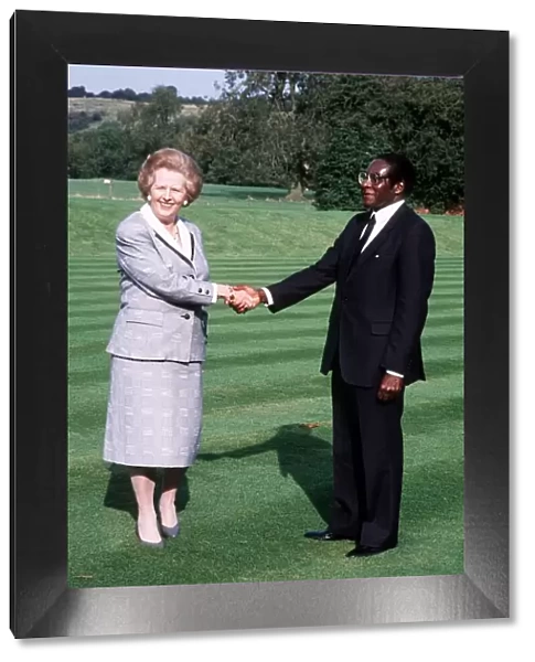 Margaret Thatcher British Prime Minister - Oct 1988 with President Robert Mugabe