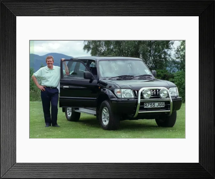 Framed Print : Colin Montgomerie and Toyota Colorado July 1998 Scot golfer with car for