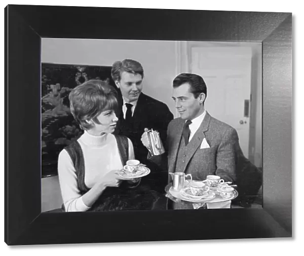 Dirk Bogarde with movie stars of the film The Servant - Wendy Craig - during a tea