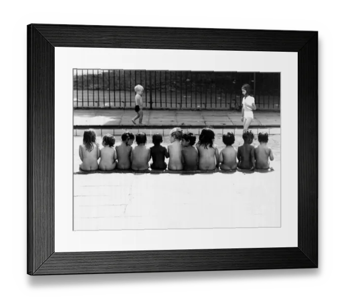 Framed Print : Soaring temperatures were no problems for these youngsters as they stripped off Framed Print : Soaring temperatures were no problems for these youngsters as they stripped off