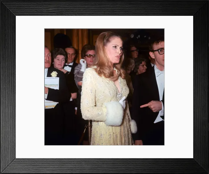 Framed Print : Ursula Andress and Woody Allen at the Royal premiere of the film Born Free March Framed Print : Ursula Andress and Woody Allen at the Royal premiere of the film Born Free March