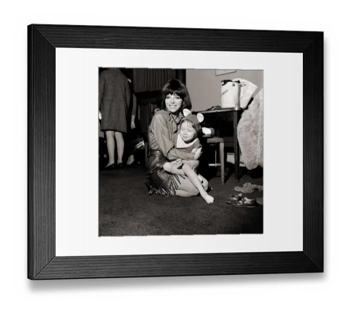 Framed Print : Mrs Anthony Newley (actress Joan Collins) this afternoon was acting as dresser to her 5