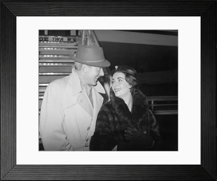 Framed Print : Actress Elizabeth Taylor with husband Michael Wilding November 1955