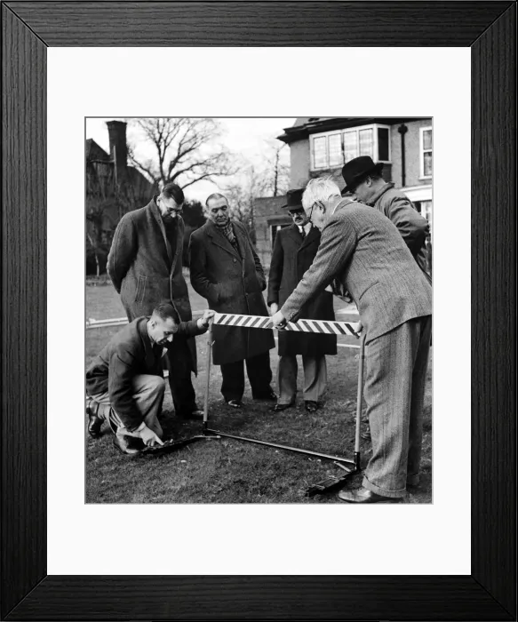 Framed Print : Olympic Games 1948 Mr Rottenburg explains the action of the extension Framed Print : Olympic Games 1948 Mr Rottenburg explains the action of the extension