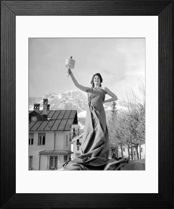 Framed Print : Winter Olympic Games 1956 Woman posing holding the Olympic Flame