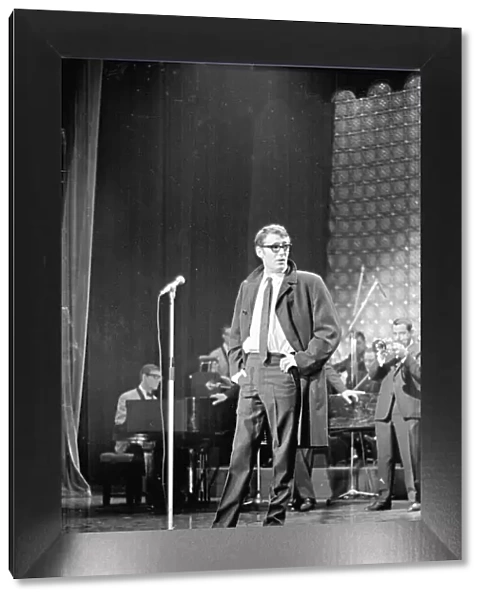 Actor Peter O Toole on stage at Stars Shine for Jack Hylton with an orchestra