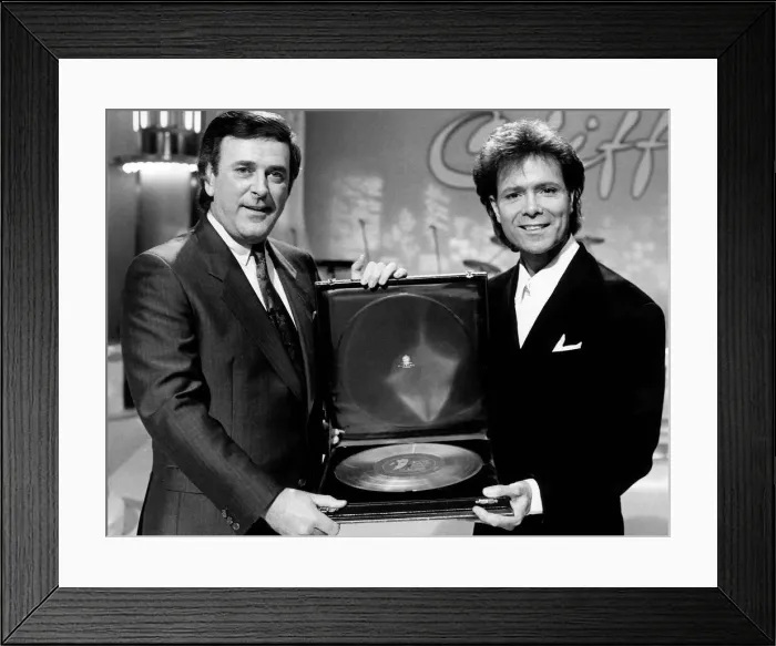 Framed Print : Cliff Richard Singer actor with Terry Wogan receiving award. November 1988 Framed Print : Cliff Richard Singer actor with Terry Wogan receiving award. November 1988