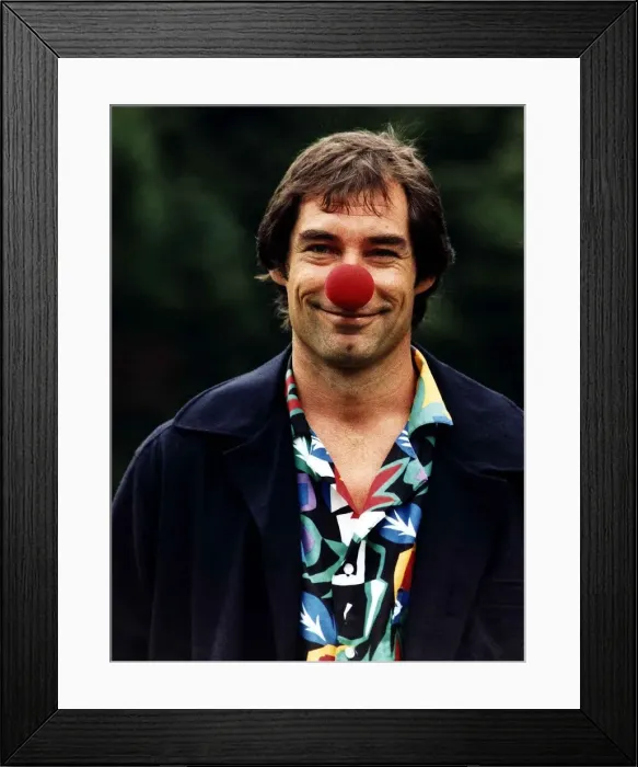 Framed Print : Timothy Dalton Actor wearing a red nose for Comic Relief Framed Print : Timothy Dalton Actor wearing a red nose for Comic Relief