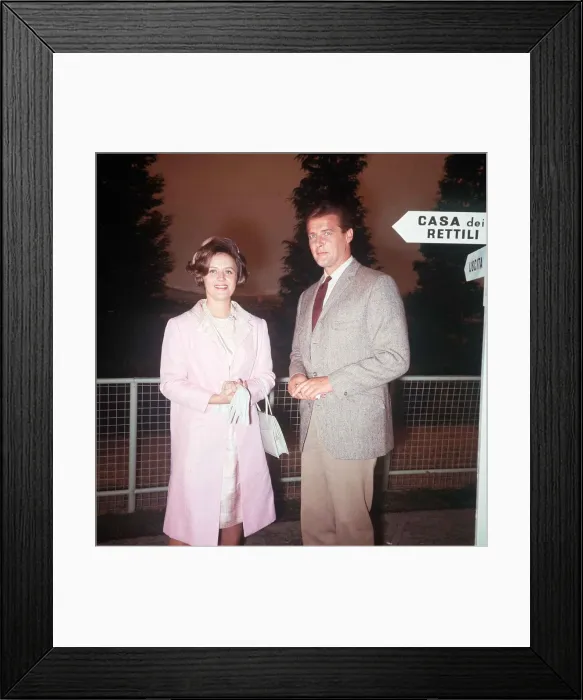 Framed Print : Roger Moore Actor shows Princess Muna around Elstree studios on the set of the TV Prog Framed Print : Roger Moore Actor shows Princess Muna around Elstree studios on the set of the TV Prog