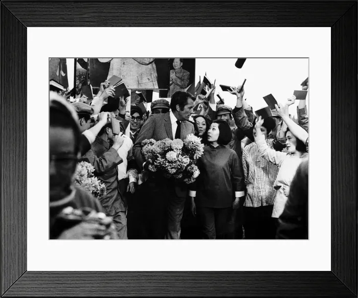 Framed Print : Gregory Peck actor arrives at Denham airport to be greeted by Chinese actors that star