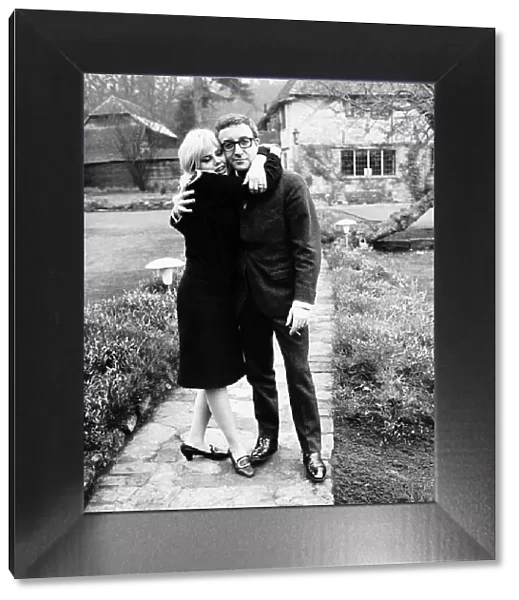 Peter Sellers actor with actress Britt Ekland at home in their garden
