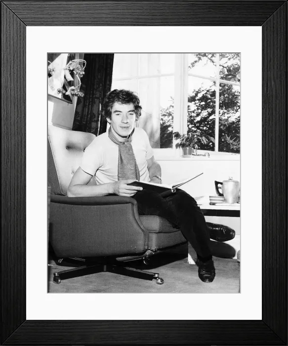 Framed Print : Ian Mckellen Actor October 1969 Pictured sitting in chair with a book
