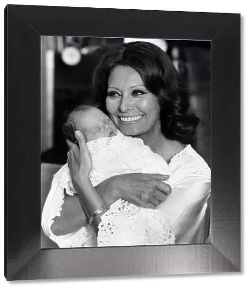 Actress Sophia Loren with baby Anita Cookson in August 1980