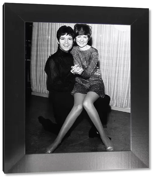 Cliff Richard Actor  /  Singer with Cilla Black sitting on his knee