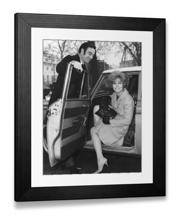 Framed Print : Kim Novak actress and husband Richard Johnson actor leaving London nursing home after